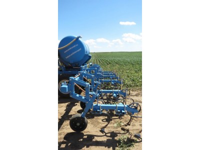 Inter-row cultivators with liquid fertilizer adapter